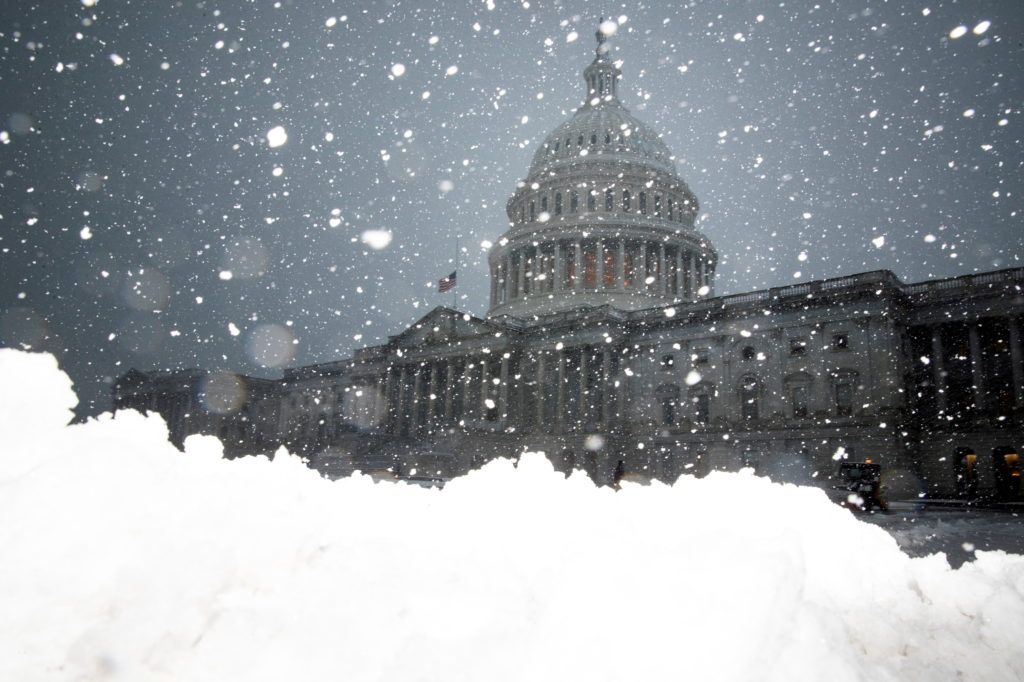 Snow falls along the East Front Plaza during a storm on Capitol Hill in Washington, U.S., January 3, 2022. REUTERS/Tom Brenner